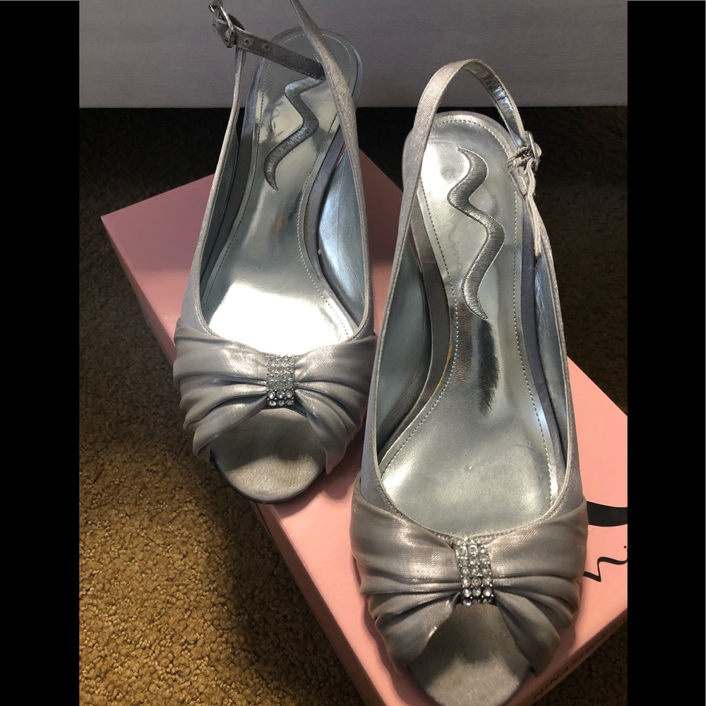 Open toe silver sling back heels